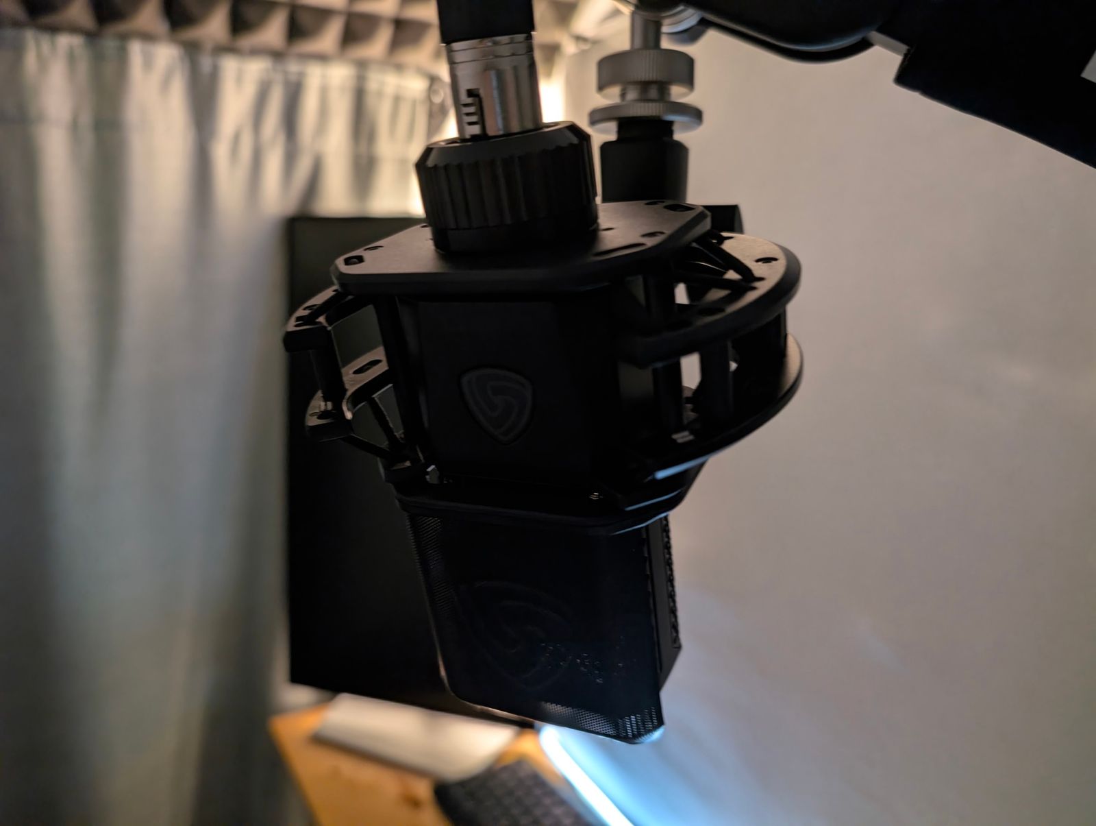 The Lewitt LCT 440 PURE on its shock mount inside the booth.
